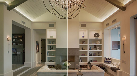 Residential interior showing warm and cool white lighting side by side under a vaulted ceiling