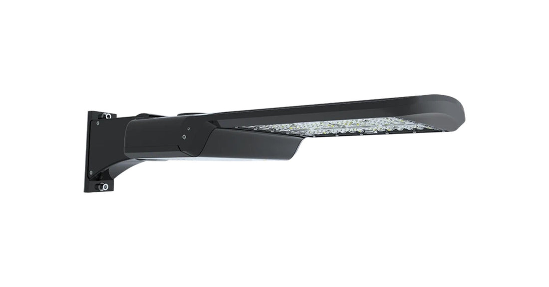 RAB A17 III LED area light in bronze on its pole mounting arm, with the LED array visible