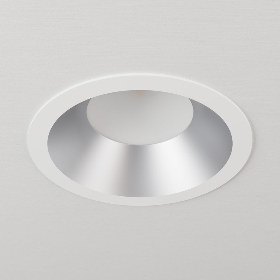 DMF Lighting C6TRSSP C-Series 6 inch standard round trim, semi-specular with white flange, shown in ceiling.
