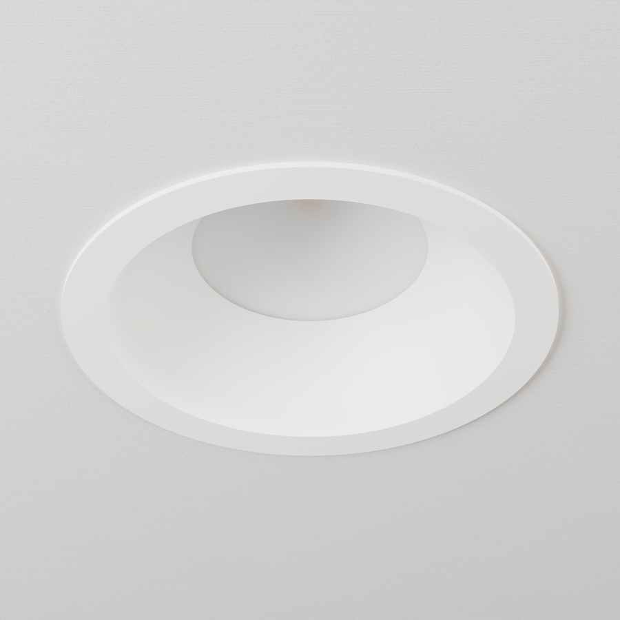 DMF Lighting C6TRSWH C-Series 6 inch standard round trim in white, shown in ceiling.